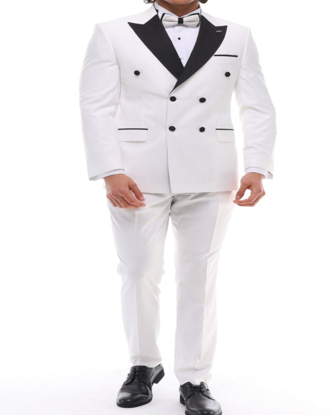 White double breasted tuxedo with black lapel and white trousers, paired with a bow tie and pocket square.